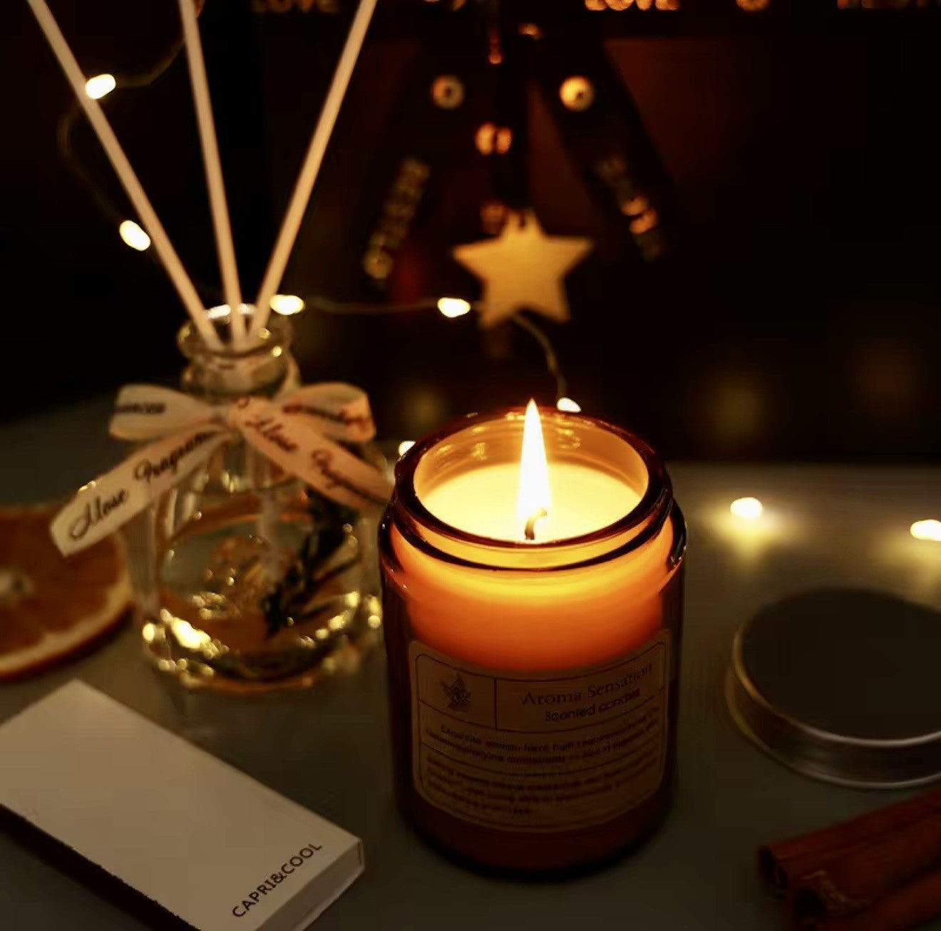 Boîte aromatique avec huile lime, basilic et citron. Chandelle odeur de poire anglaise et freesia.